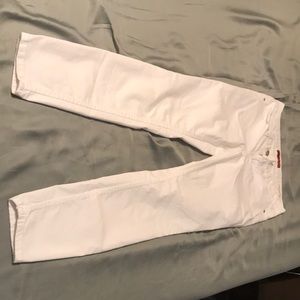 Guess white low rise skinny jeans size 29